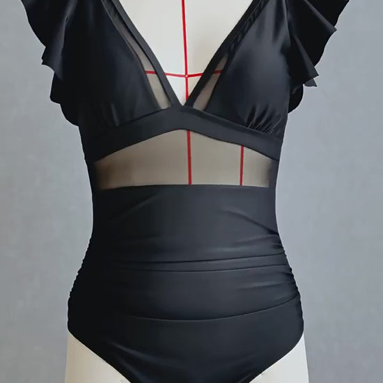 Black Swimsuit with Ruffled Sleeve.